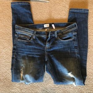 Sneak peek ripped skinny jeans